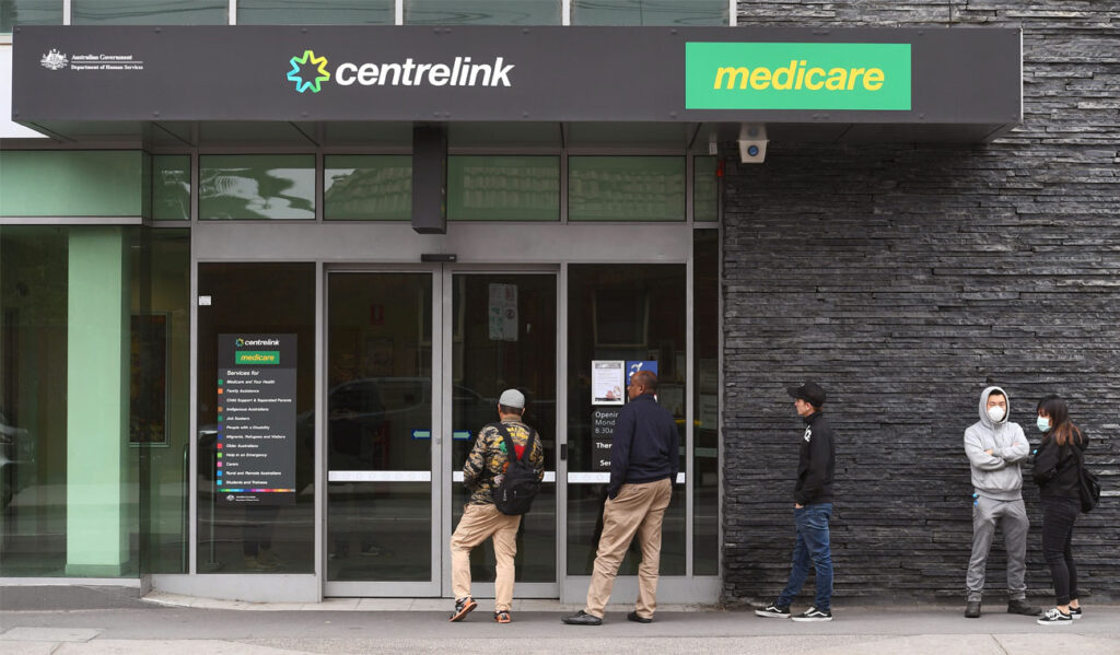 Unemployment cues at Centrelink for After Loosing a Job and Experiencing Financial Stress