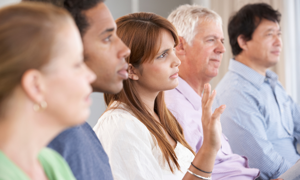 Group of people listening intently